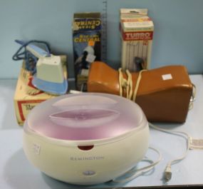 Remington Paraffin Wax Spa along with Four Clothes Steamers and a Neck Massager
