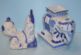 Blue and White Porcelain Reclining Chinese Boy and a Blue and White Porcelain Elephant