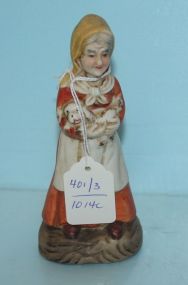 Bisque Figurine of an Elder Lady Holding a Dog