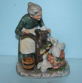 Bisque Figurine of a Lady with Ducks