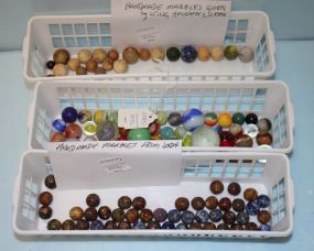 Three Sets of Marbles