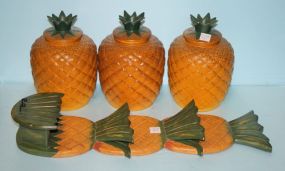 Pineapple Shaped Wooden Home Goods Wall Plaque and a Set of Three Ceramic Pineapple Shaped Canisters