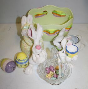 Ceramic Rabbits, Pressed Glass Basket with Handpainted Wooden Eggs, Glass Eggs, and a Ceramic Basket with Ribbon