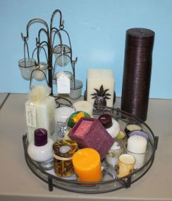 An Iron and Plastic Tray and a Group of Candles