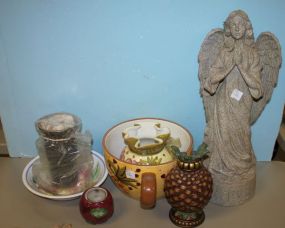 A Resin Angel, a Large Cup, and a Vase