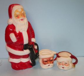 Santa Mugs and a Santa Figurine