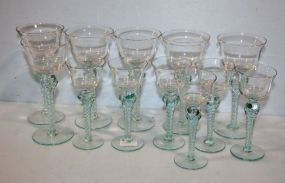 Set of Twelve Clear and Aquamarine Color Stem Glasses