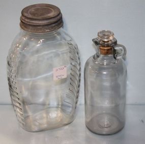 Clear Jar with Galvanized Lid and a Small Glass Pitcher
