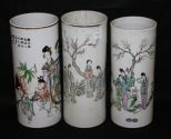 Three Porcelain Tubular Shaped Vases with Oriental Motif