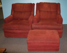 Two Club Chairs Covered in Burgundy Upholstery with Ottoman
