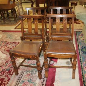 Four Oak Slat Back Chairs