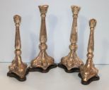 Set of Four Silver Metal Candlesticks