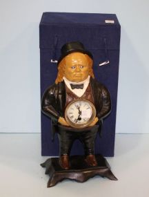 Painted Resin Figure of a Man Holding a Clock