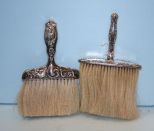 Two Clothes Brushes