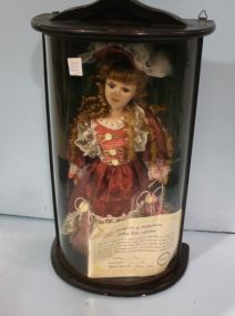 Doll in Display Cabinet