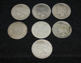 Seven Liberty Silver Dollars
