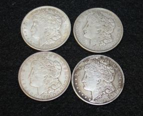 Four Morgan Silver Dollars