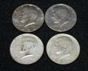 Four Kennedy Half Dollars