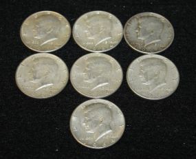 Seven 1964 Silver Kennedy Half Dollars