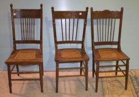 Three Oak Cane Seat Chairs
