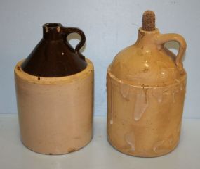 Two Old Clay Whiskey Jugs