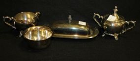 Group of Silverplate Items Four silverplate pieces, sugar, creamer, butter, small bowl (4
