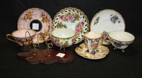 Group of Four Cups and Saucers and Display