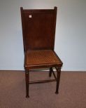Walnut Cane Seat Chair with Ponts Press on Back