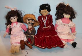 Group of Four Dolls