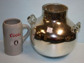 Silver Vase with Glass Handles and a Coors Light Stein
