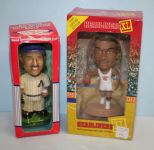 Two Bobble Head Figures