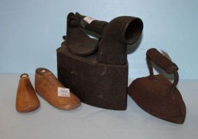 Two Antique Irons along with Two Wood Shoe Forms