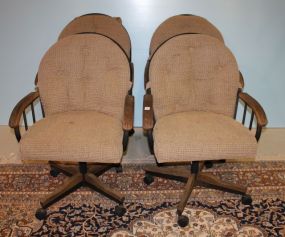 Four Swivel Chairs