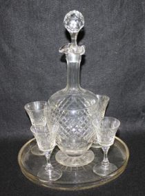 Cut Glass Decanter, Four Cordials and a Cut Round Tray