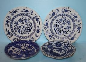 Four Blue and White Plates