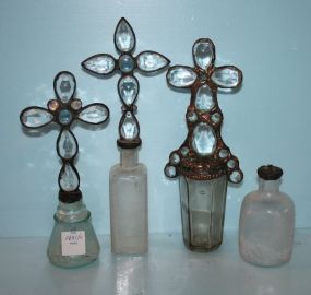 Four Glass Bottles
