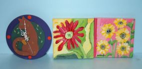 Two Hand Painted Squares of Flowers, signed Buchanan along with Hand Painted Wall Clock of Cat