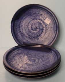 Group of Four Blue Pottery Plates