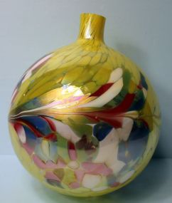 Multicolor Blown Glass Bulb Resting in Large Clear Glass Stem