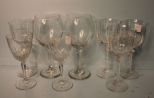 Eight Clear Glasses in Various Sizes