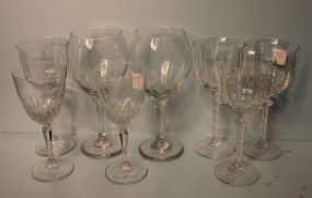 Eight Clear Glasses in Various Sizes