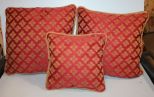 Three Burgundy Throw Pillows