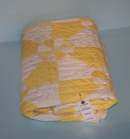 Yellow and White Triangular Pattern Quilt