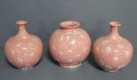 Three Pink Ceramic Vases with Snowflake Design