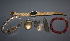 Group of Miscellaneous Jewelry and Two Pocket Knives Description