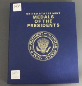 Book with Presidential Medals Description