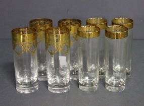 Set of Clear Glasses with Gold Swag Decoration Description