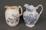 Two Antique Flow Blue Pitchers