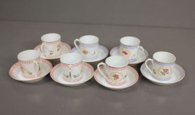 Set of Seven Demitasse Cups and Saucers