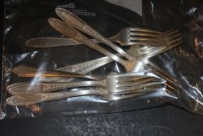 9 Silverplate Forks Eight matching